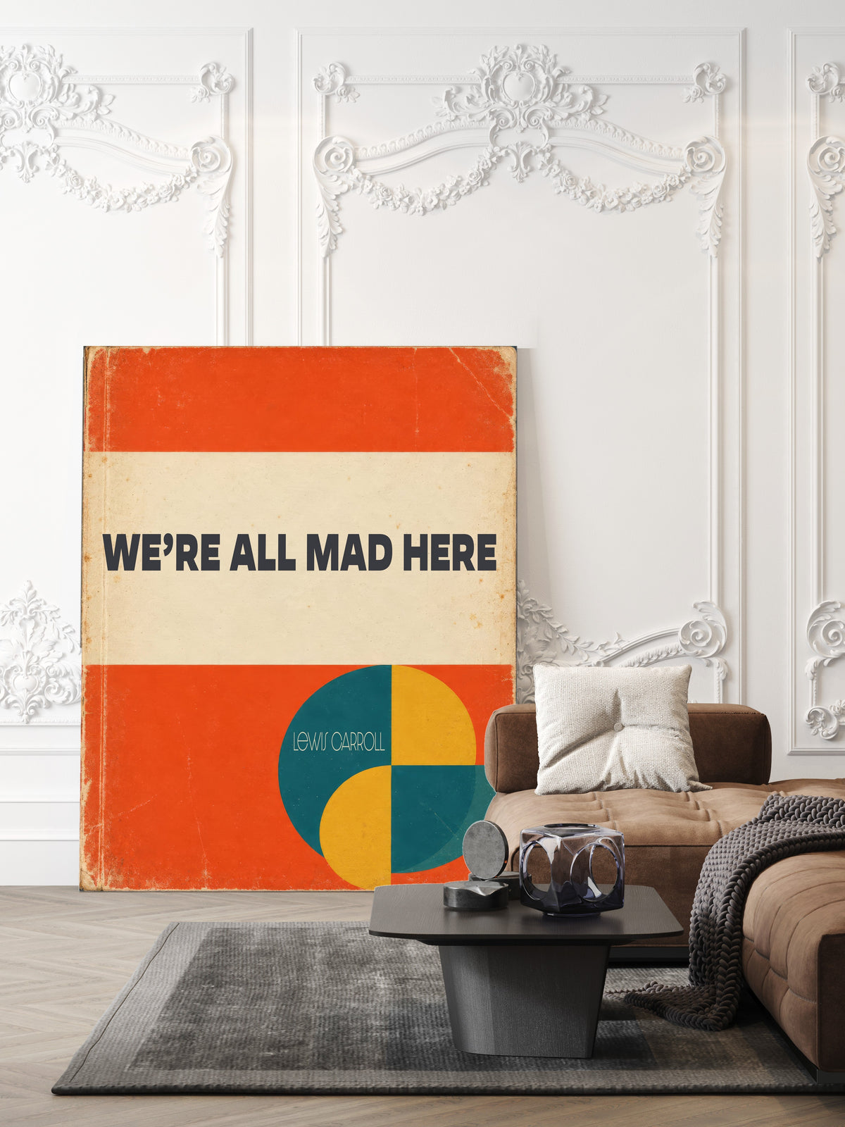We're all mad here Lewis Carroll quote print in a retro orange book cover design, shown unframed in a living room