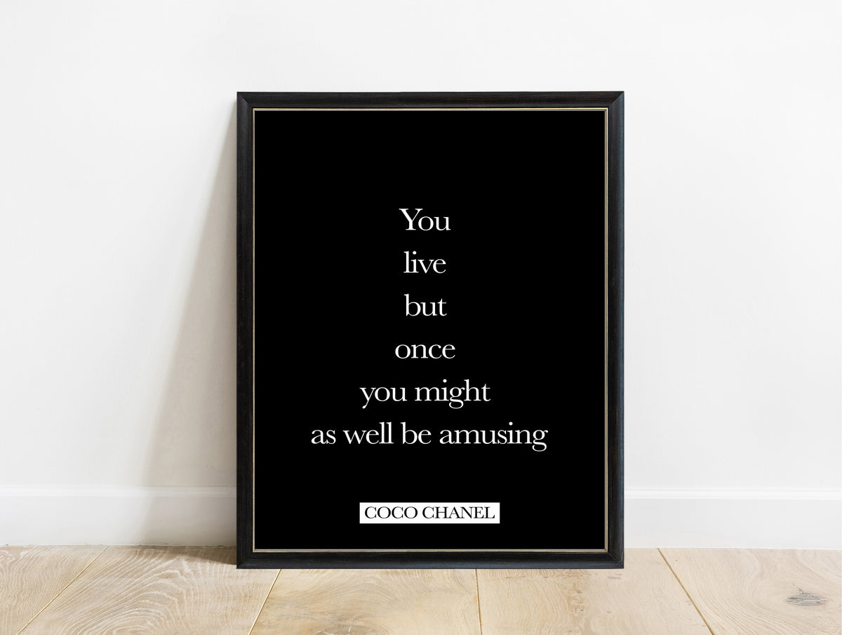 Coco Chanel you live but once quote print in a black frame, black background