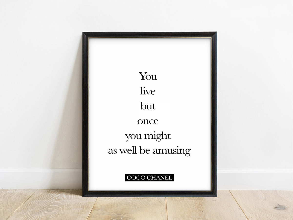 Coco Chanel you live but once quote print in a black frame, white background