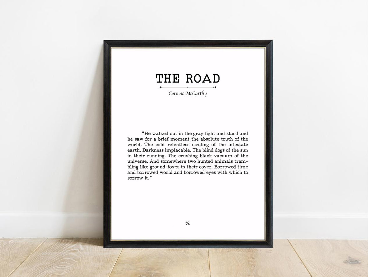 Cormac McCarthy The Road book page print in a black frame, white background