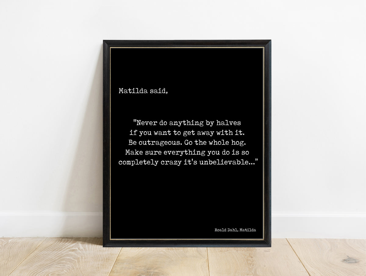 Roald Dahl Matilda never do anything by halves typewriter quote print in a black frame, black background