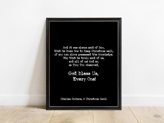 Charles Dickens God bless us, every one quote print in a black frame, black background