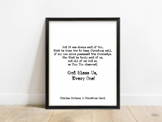 Charles Dickens God bless us, every one quote print in a black frame, white background