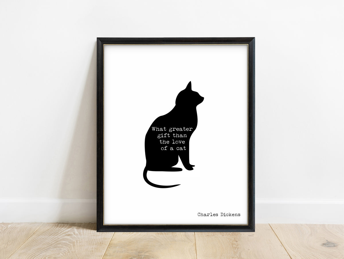 Charles Dickens love of a cat quote with a cat silhouette print in a black frame, white background