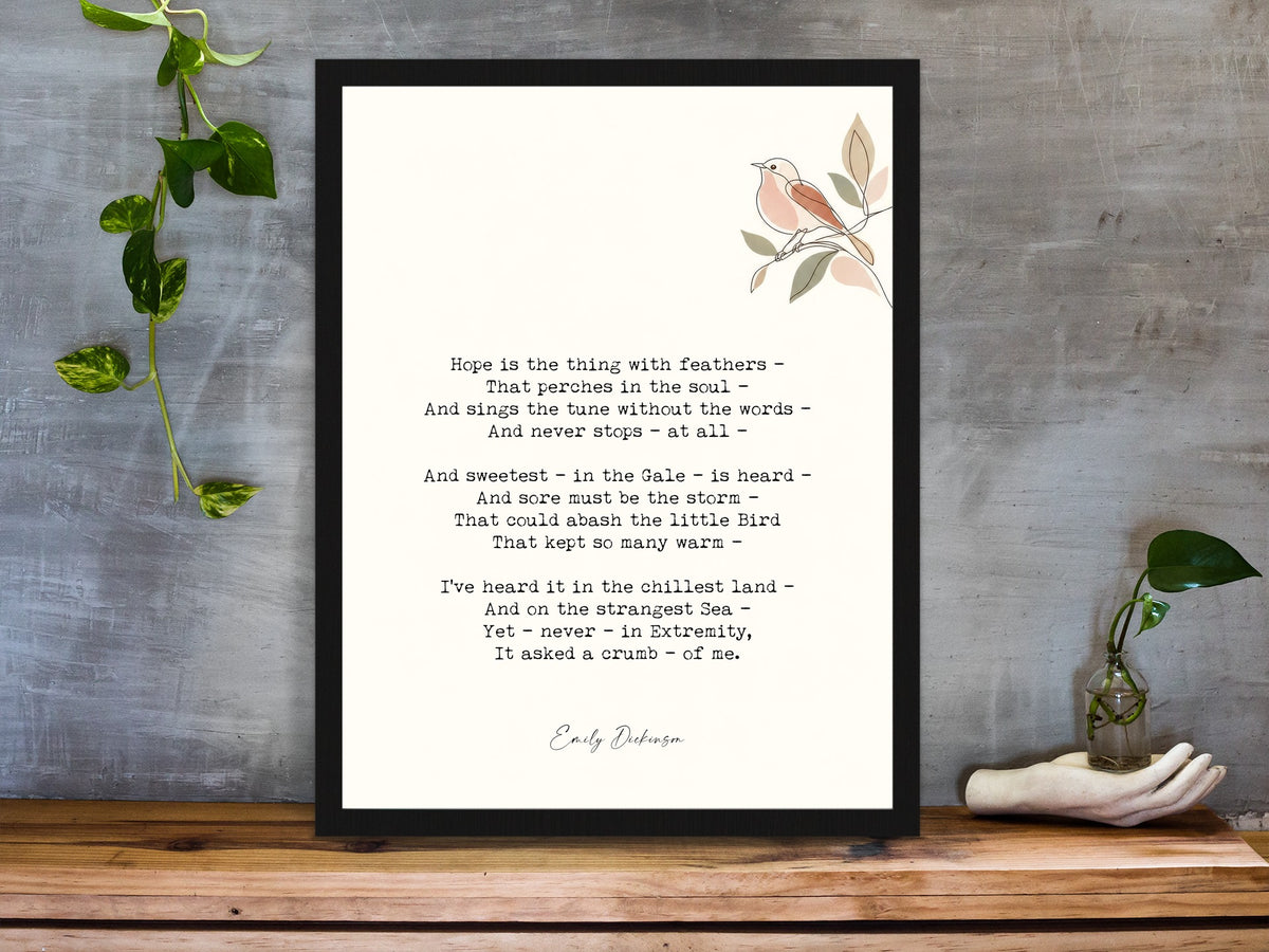 Emily Dickinson hope is the thing with feathers poem with bird illustration print framed on a desk