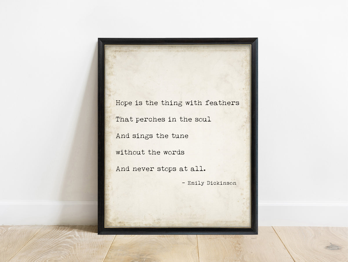 Emily Dickinson hope is the thing with feathers typewriter quote print in a black frame, vintage background