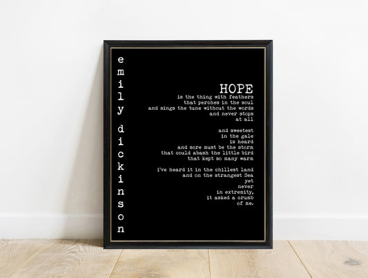 Emily Dickinson Hope is the thing with feathers vertical name print in a black frame, black background
