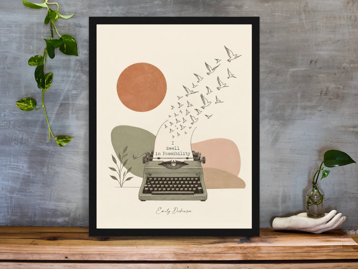Emily Dickinson I dwell in Possibility quote with a vintage typewriter and birds illustration print framed on a desk