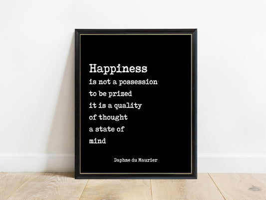Daphne du Maurier happiness is not a possession typewriter quote print in a black frame, black background