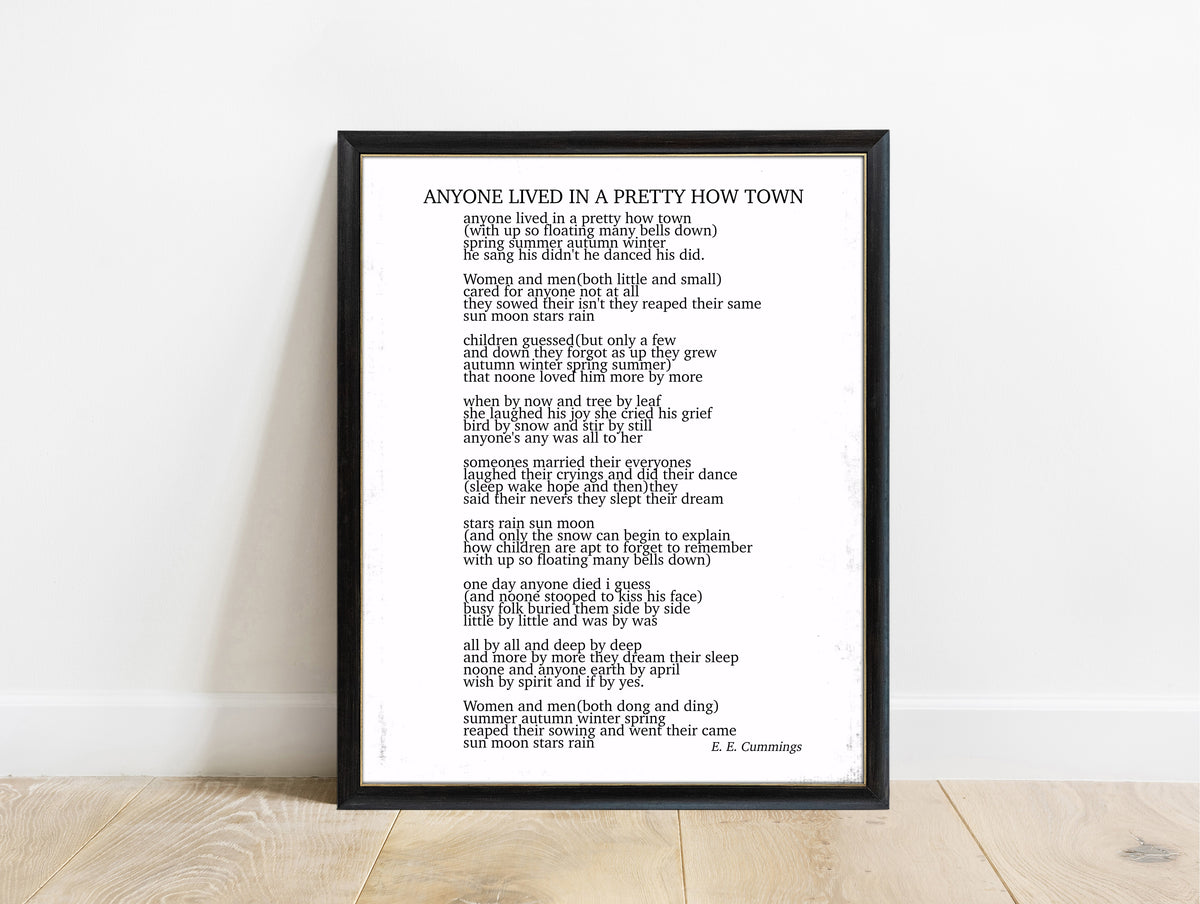 EE Cummings anyone lived in a pretty how town poem print in a black frame, white background