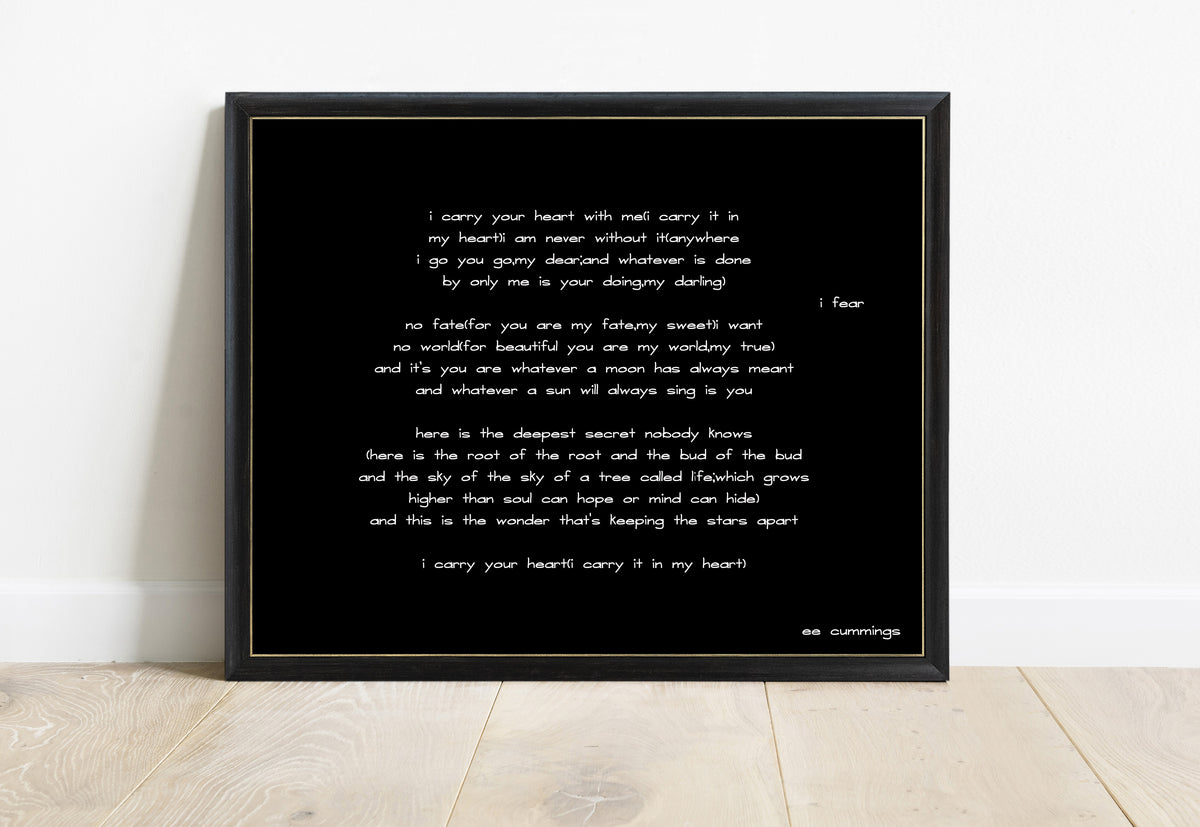 EE Cummings i carry your heart landscape print in a black frame, black background