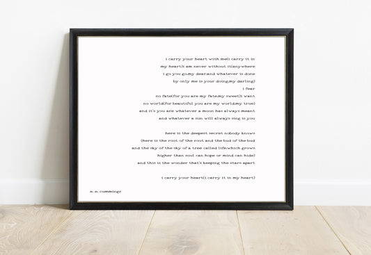 EE Cummings i carry your heart landscape right justified print in a black frame, white background