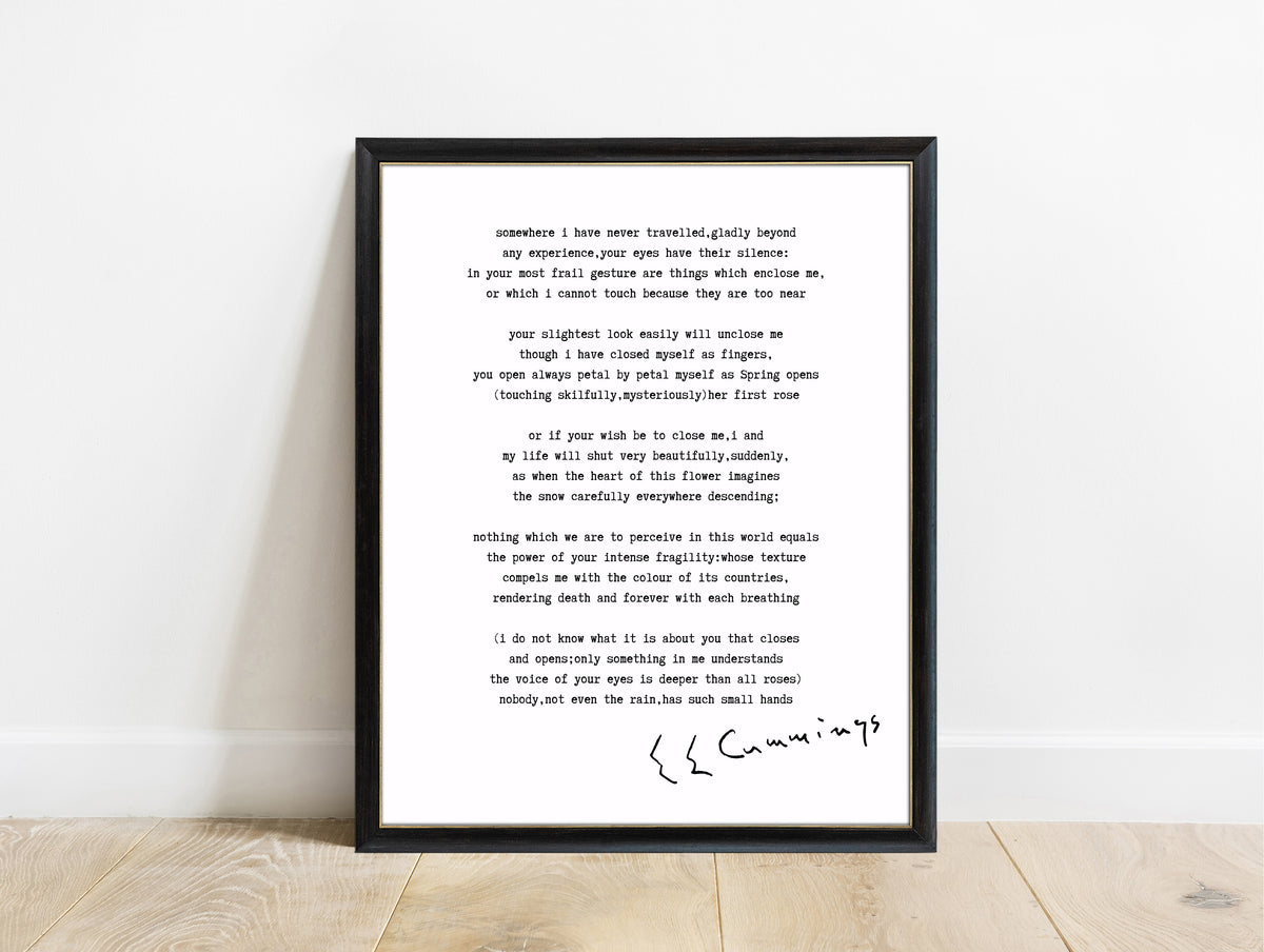 EE Cummings Somewhere I Have Never Travelled poem print in a black frame, white background