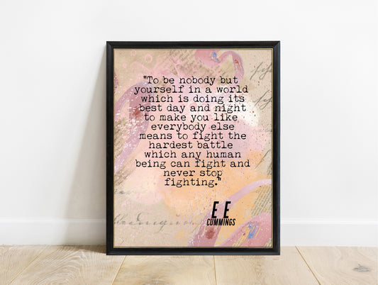 EE Cummings To Be Nobody But Yourself print on a watercolour abstract background in a black frame