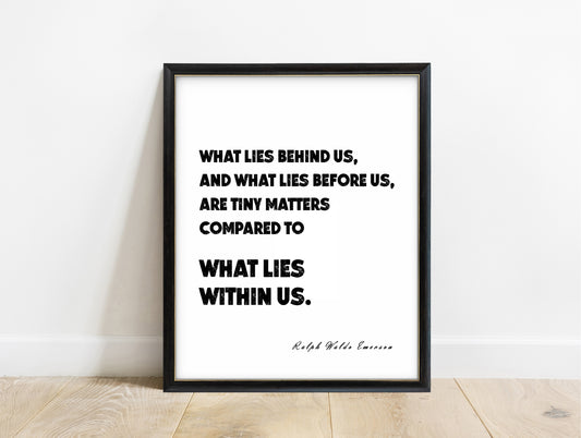 Ralph Waldo Emerson what lies within us quote print in a black frame, white background