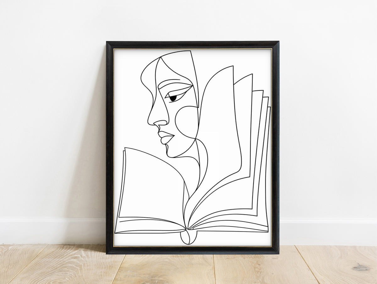 Abstract face in profile flowing into an open book, line art print, black lines on white, in a black frame