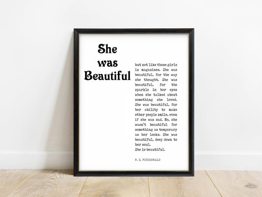 F Scott Fitzgerald she was beautiful magazine style quote print in a black frame, white background
