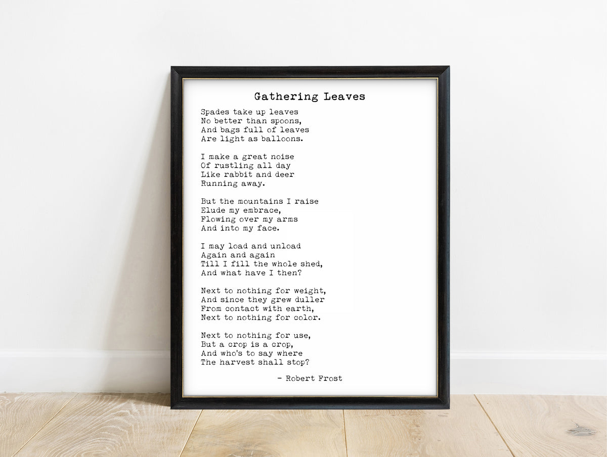 Robert Frost Gathering Leaves poem print in a black frame, white background