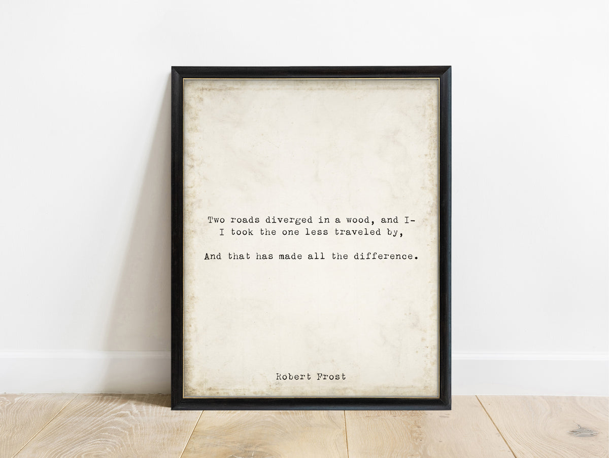 Robert Frost two roads diverged quote print from The Road Not Taken in a black frame, vintage background