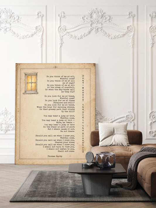 Thomas Hardy Dead Wessex the Dog to the Household poem print on a vintage page with a small lit window, shown unframed in a living room