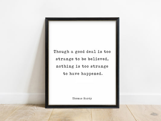 Thomas Hardy nothing is too strange to have happened typewriter quote print in a black frame, white background