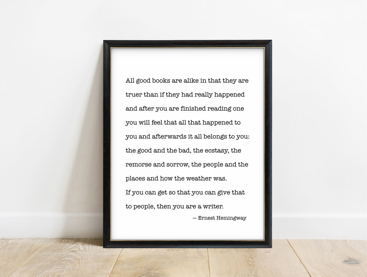 Ernest Hemingway all good books are alike quote print in a black frame, white background