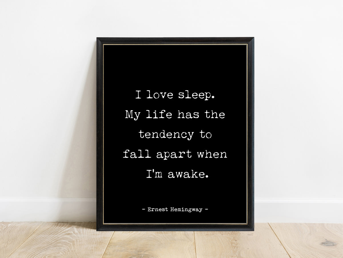 Ernest Hemingway I love sleep quote print in a black frame, black background