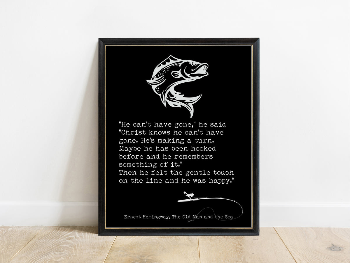 Ernest Hemingway The Old Man and the Sea he can't have gone quote print with leaping fish in a black frame, black background