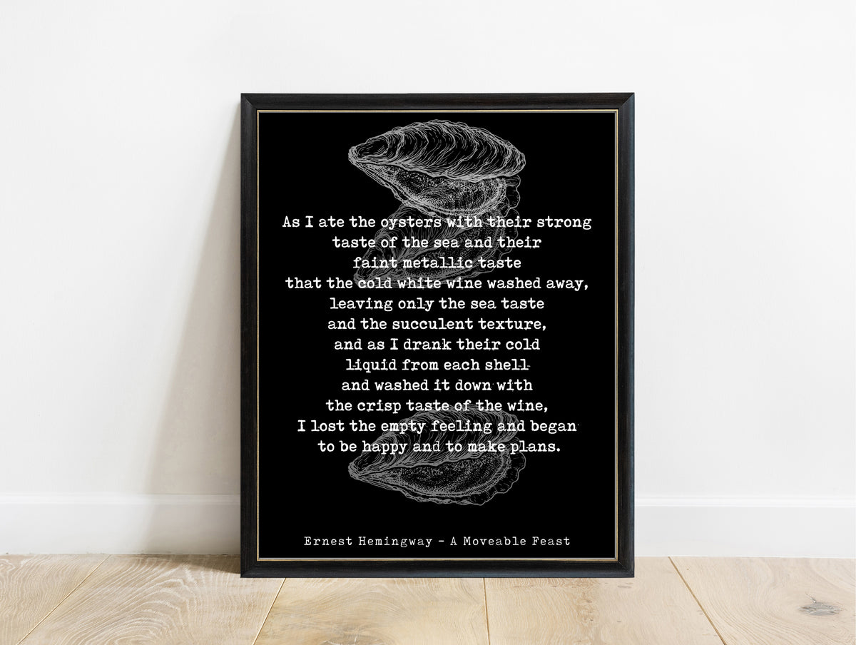 Ernest Hemingway A Moveable Feast oysters full passage print with oyster shell illustrations in a black frame, black background