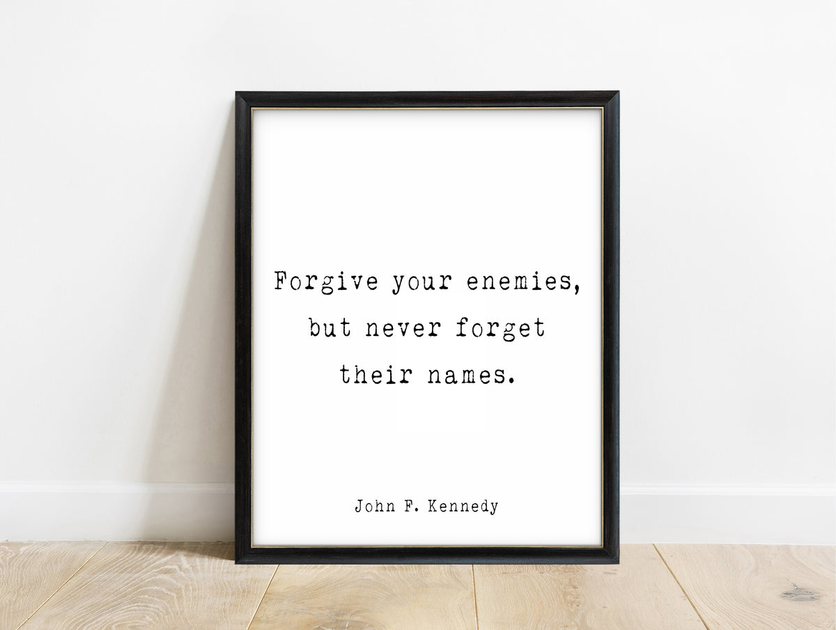 John F. Kennedy forgive your enemies quote print in a black frame, white background