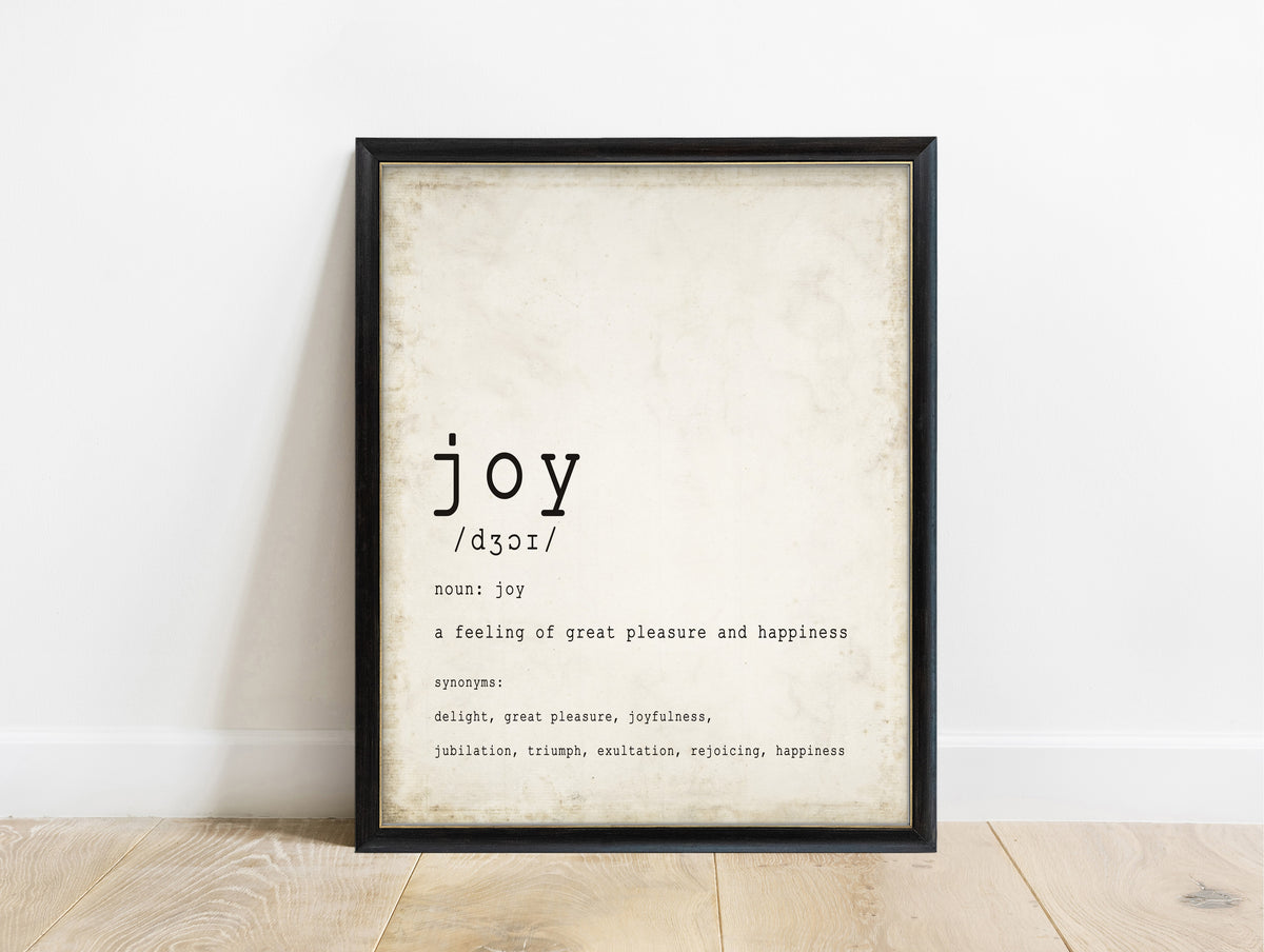 Joy definition dictionary print in a black frame, vintage background