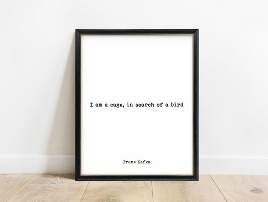Franz Kafka I am a cage in search of a bird typewriter quote print in a black frame, white background