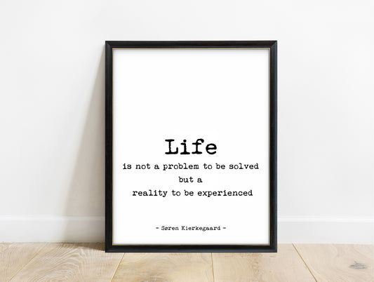 Søren Kierkegaard life is not a problem to be solved typewriter quote print in a black frame, white background