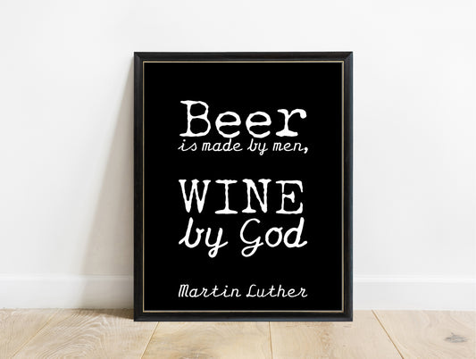 Martin Luther beer is made by men wine by God print in a black frame, black background