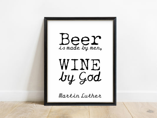 Martin Luther beer is made by men wine by God print in a black frame, white background
