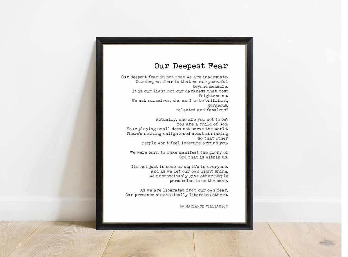 Marianne Williamson Our Deepest Fear book page print in a black frame, white background