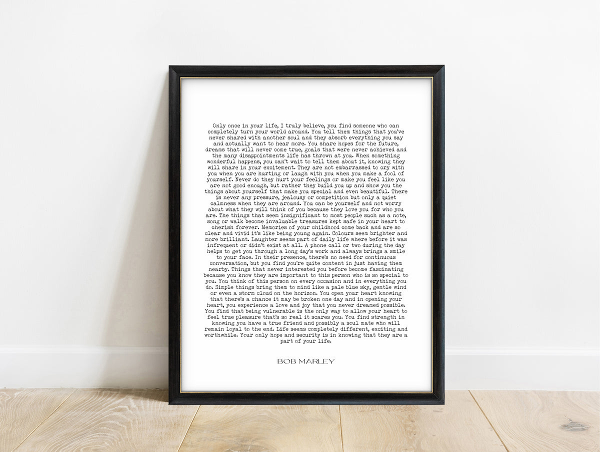 Bob Marley only once in your life full text love quote print in a black frame, white background