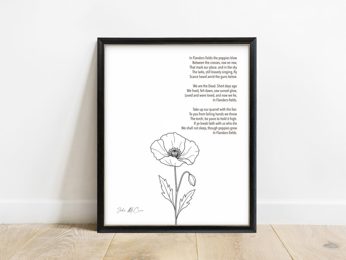 In Flanders Fields poem by John McCrae with a single poppy line drawing, remembrance poem print in a black frame