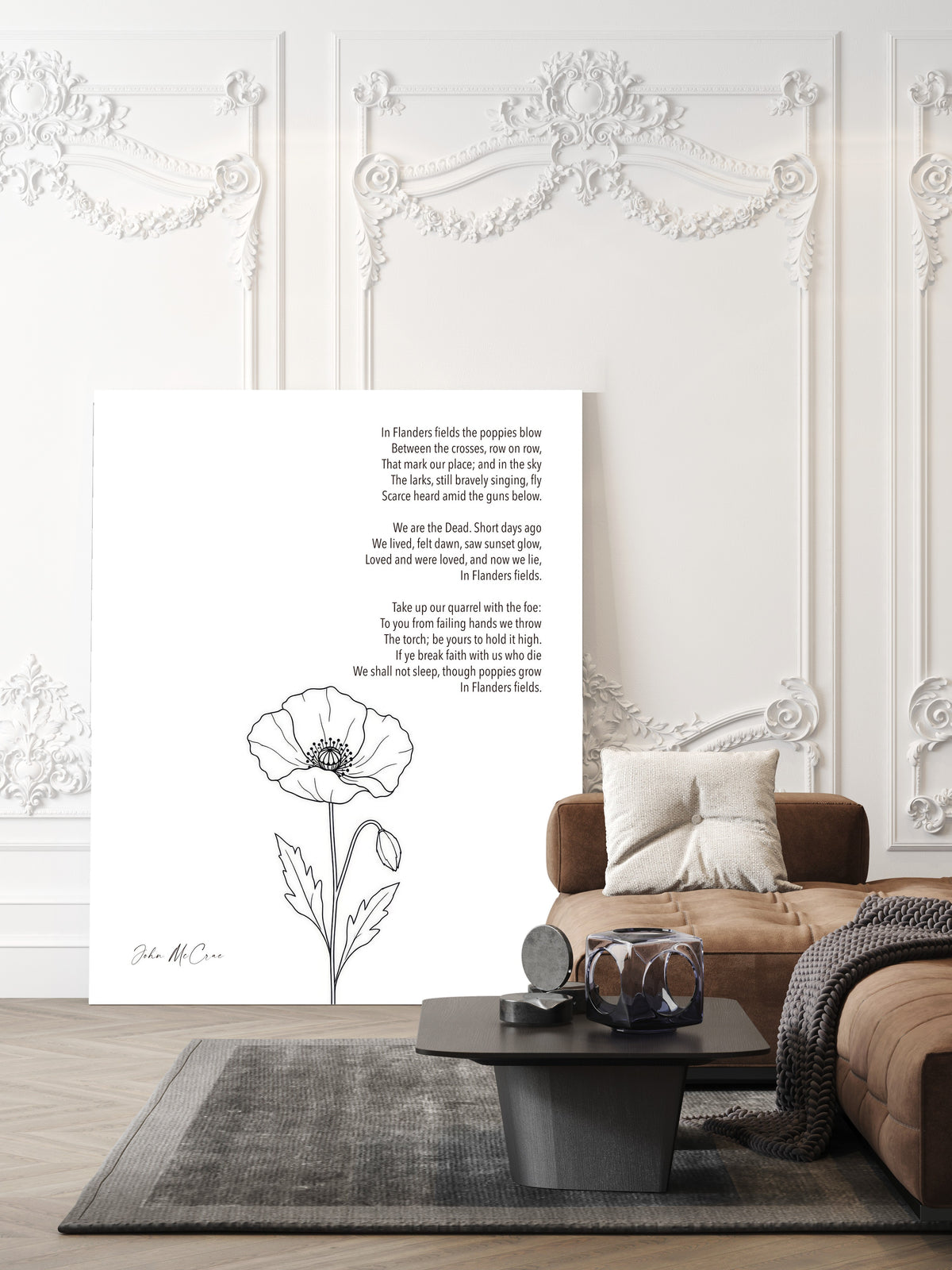 In Flanders Fields poem by John McCrae with a single poppy line drawing, remembrance poem print shown unframed in a living room