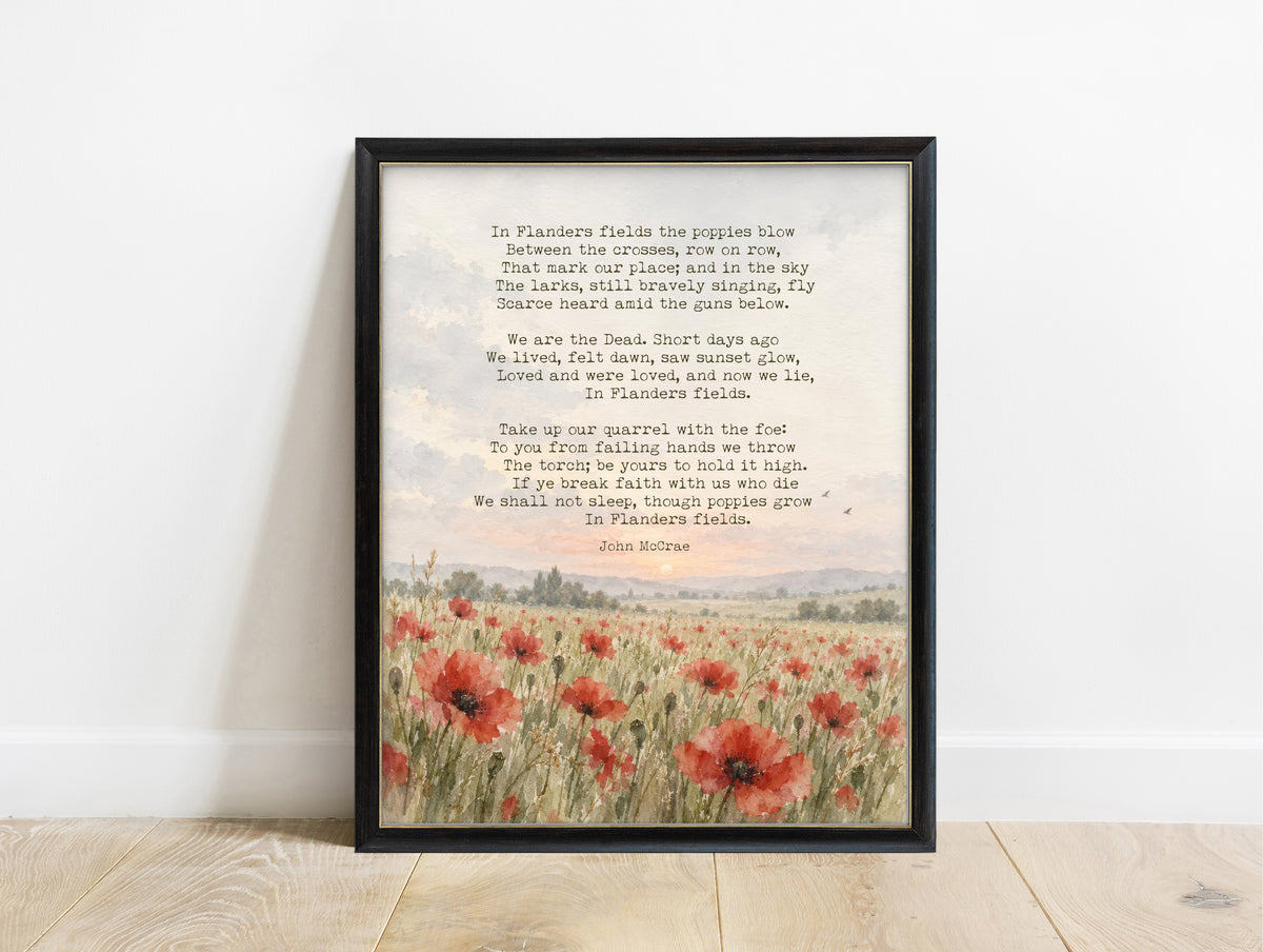 In Flanders Fields poem by John McCrae above a watercolour meadow of red poppies, remembrance poem print in a black frame