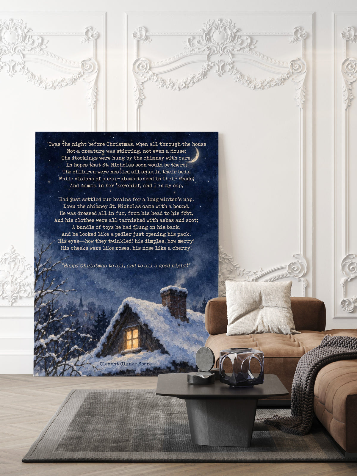 'Twas the night before Christmas poem lines by Clement Clarke Moore over a snowy cottage at night, watercolour Christmas print shown unframed in a living room