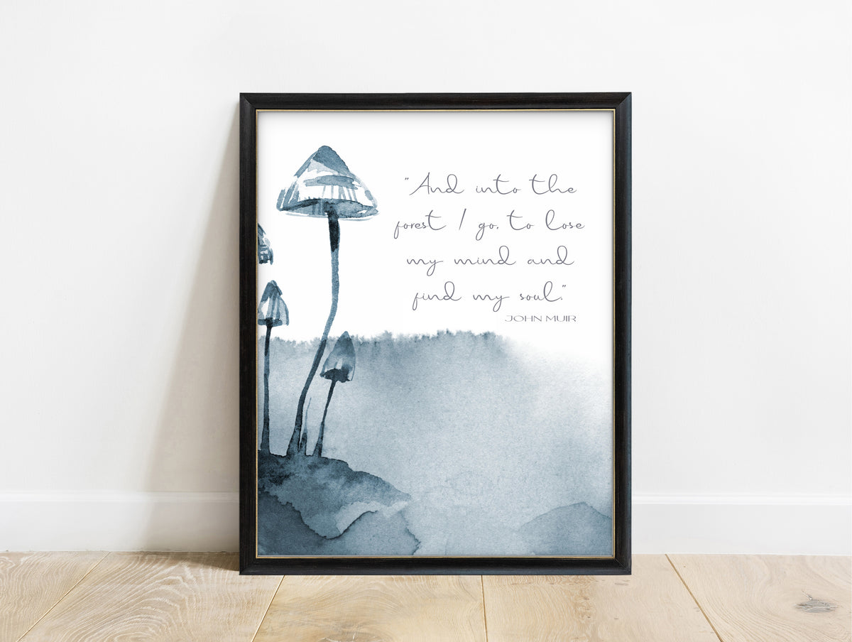 John Muir and into the forest I go quote print with blue ink mushrooms, in a black frame
