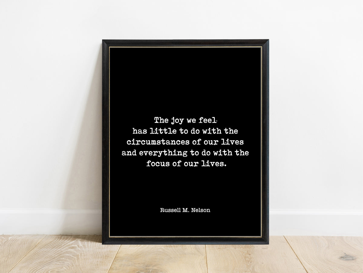 Russell M. Nelson the joy we feel typewriter quote print in a black frame, black background