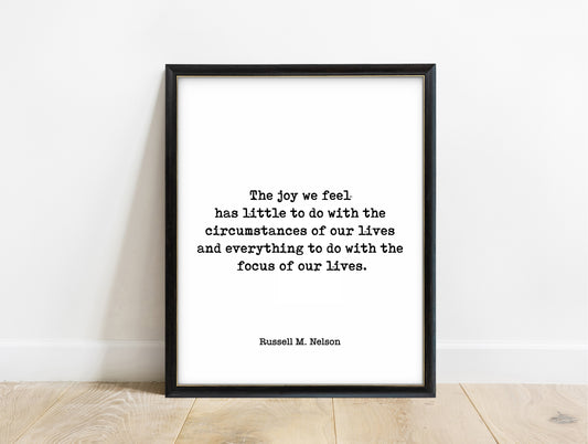 Russell M. Nelson the joy we feel typewriter quote print in a black frame, white background
