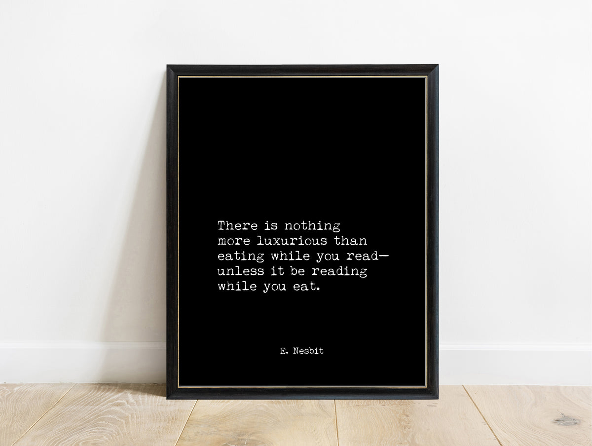 E. Nesbit eating while you read typewriter quote print in a black frame, black background