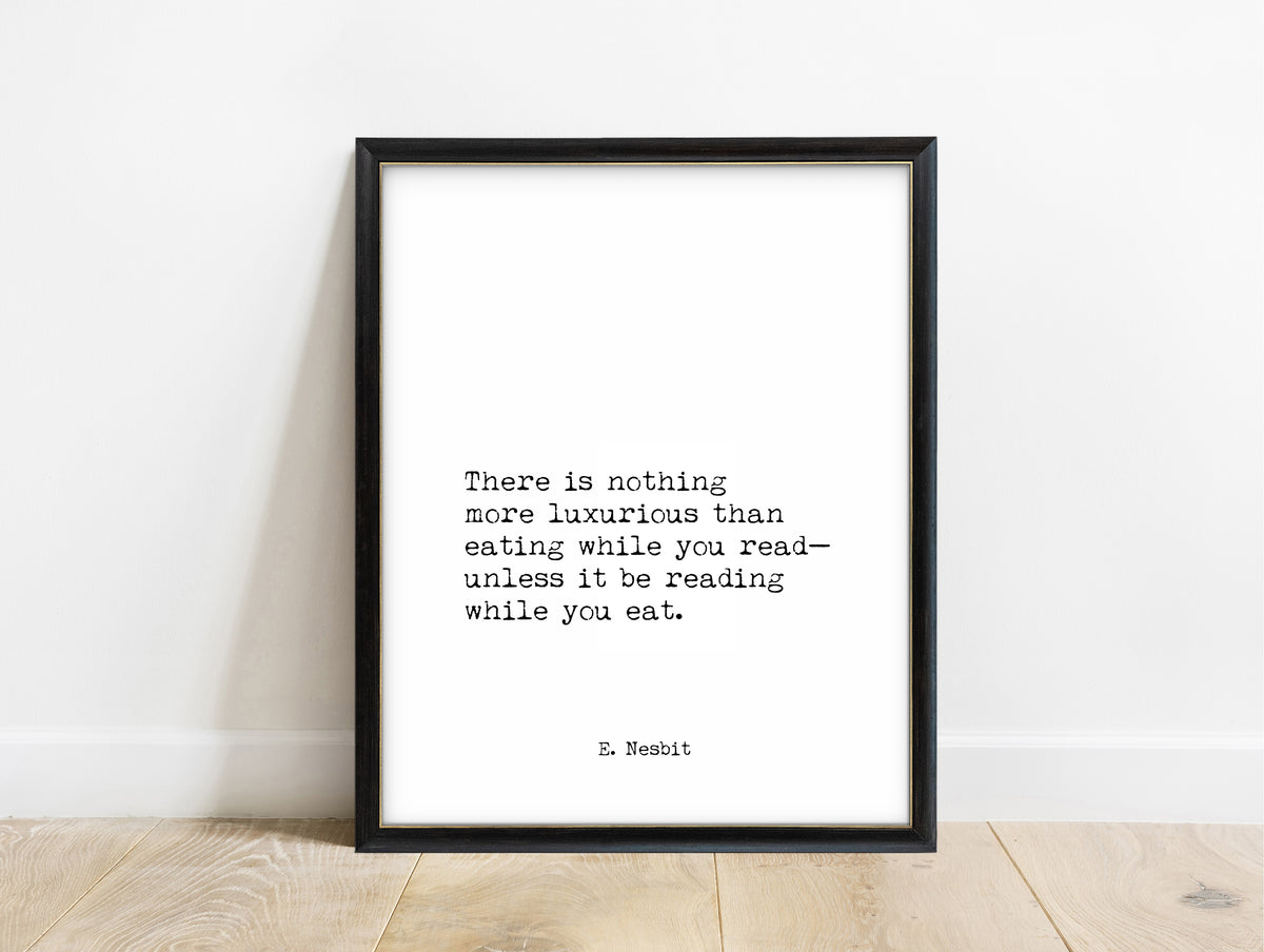 E. Nesbit eating while you read typewriter quote print in a black frame, white background