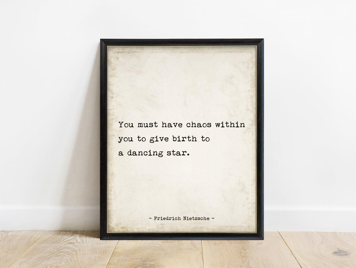 Friedrich Nietzsche chaos within you to give birth to a dancing star typewriter quote print in a black frame, vintage background