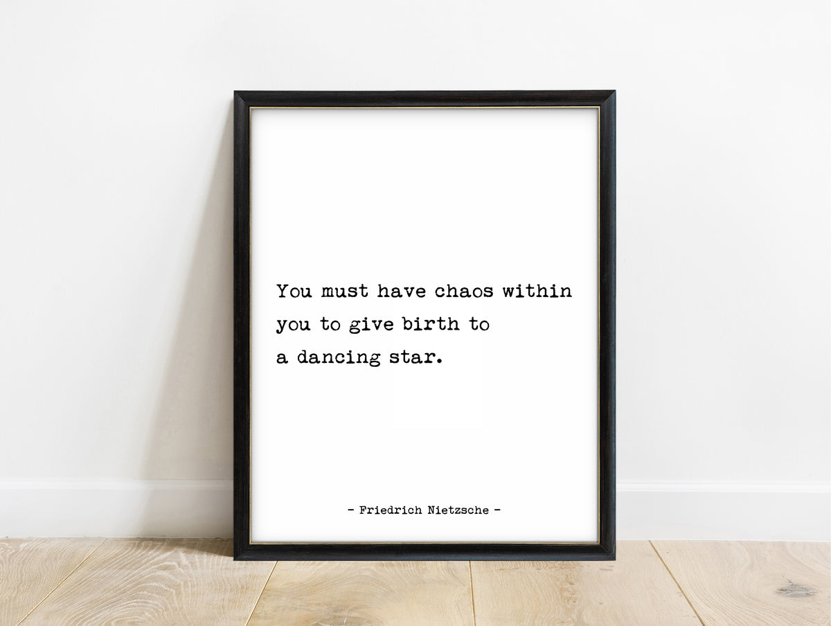 Friedrich Nietzsche chaos within you to give birth to a dancing star typewriter quote print in a black frame, white background