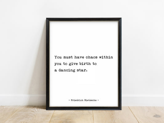 Friedrich Nietzsche chaos within you to give birth to a dancing star typewriter quote print in a black frame, white background