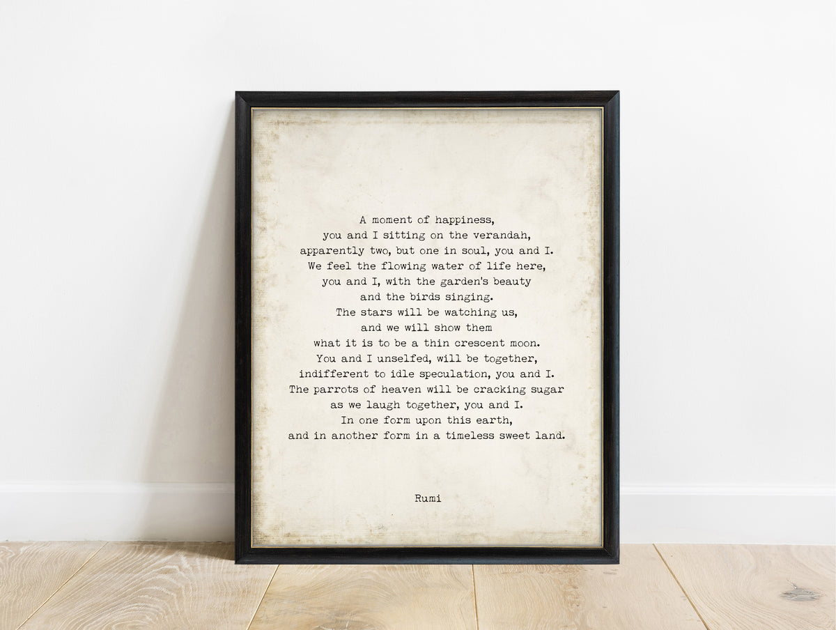 Rumi A Moment of Happiness poem print in a black frame, vintage background